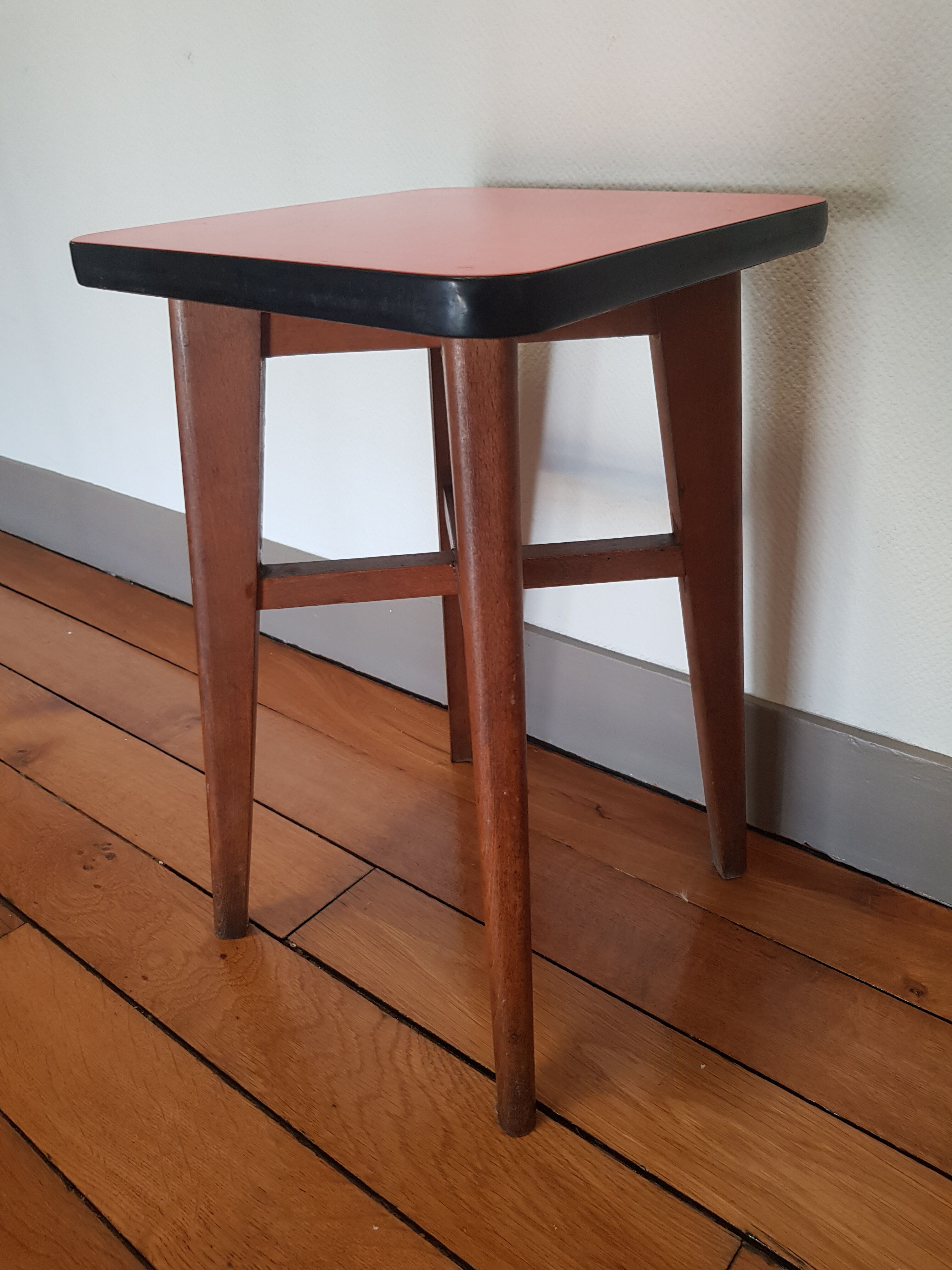 Wooden and red formica stool