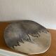 Wall-mounted aluminum plate with mountain design