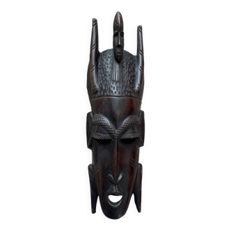 Masque africain en ébène sculpté