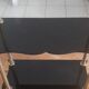 Vintage shelf of the 60s in golden metal and black plastic