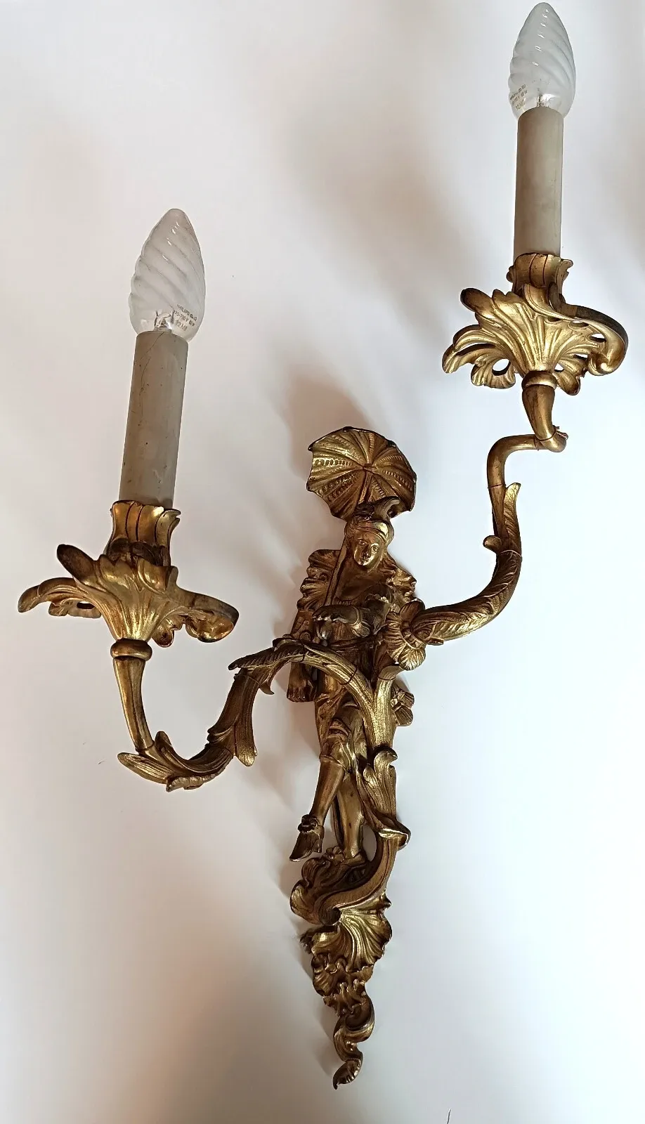 Pair of Régence style wall sconces in gilded bronze