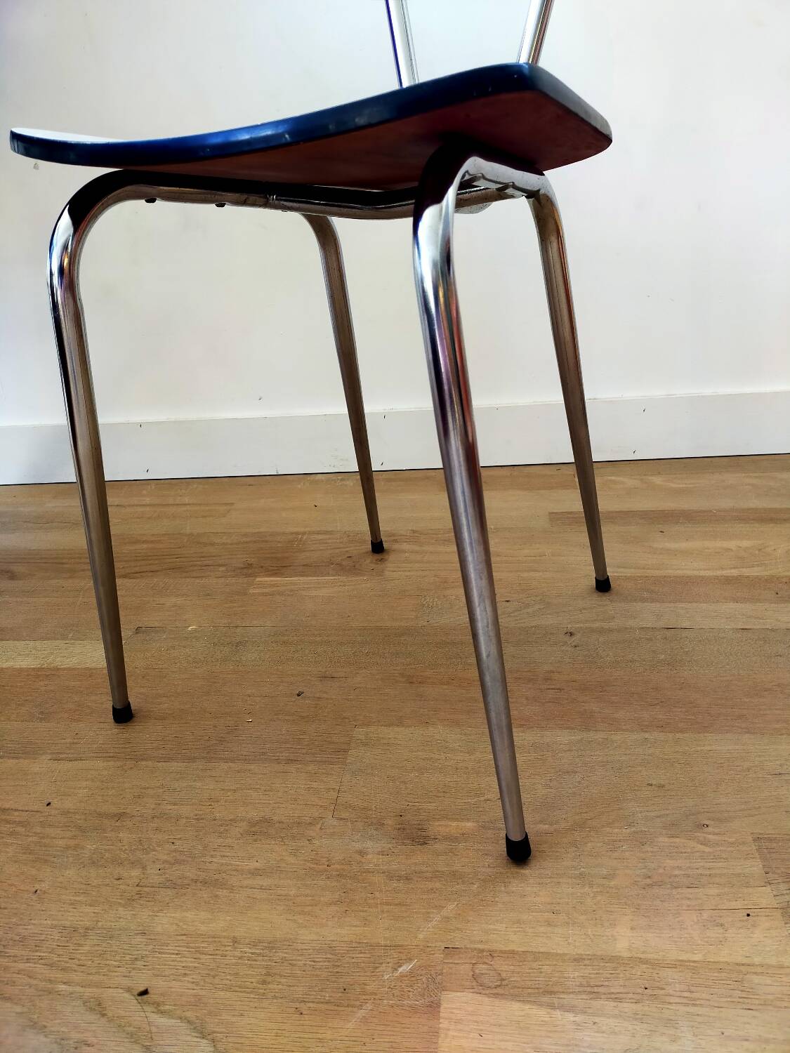 White and blue formica chair
