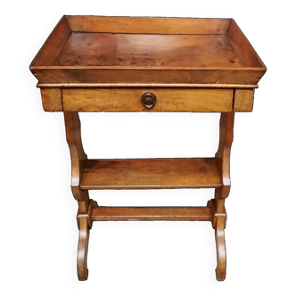 Walnut “empty pocket” table