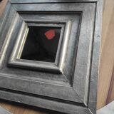 Vintage square mirror in wood covered with metal leaf, moldings in relief