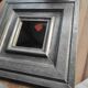 Vintage square mirror in wood covered with metal leaf, moldings in relief