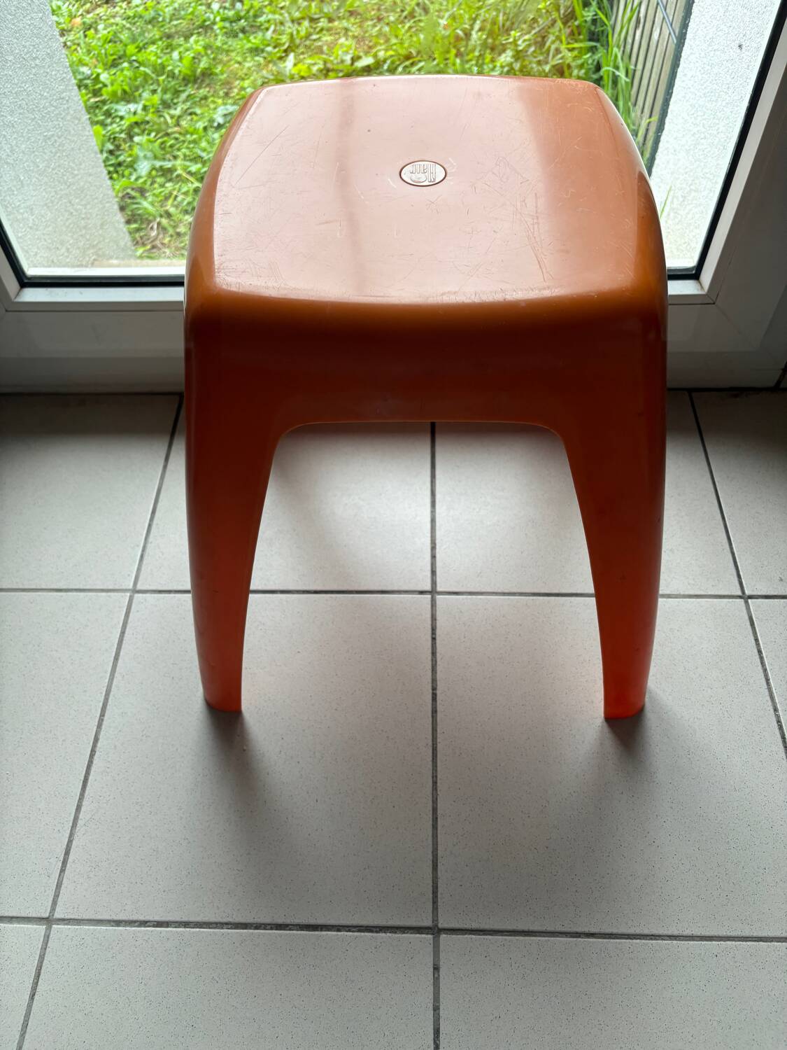 Vintage orange Flair stool from the 70s
