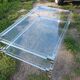 Coffee table in plexiglass and brass.