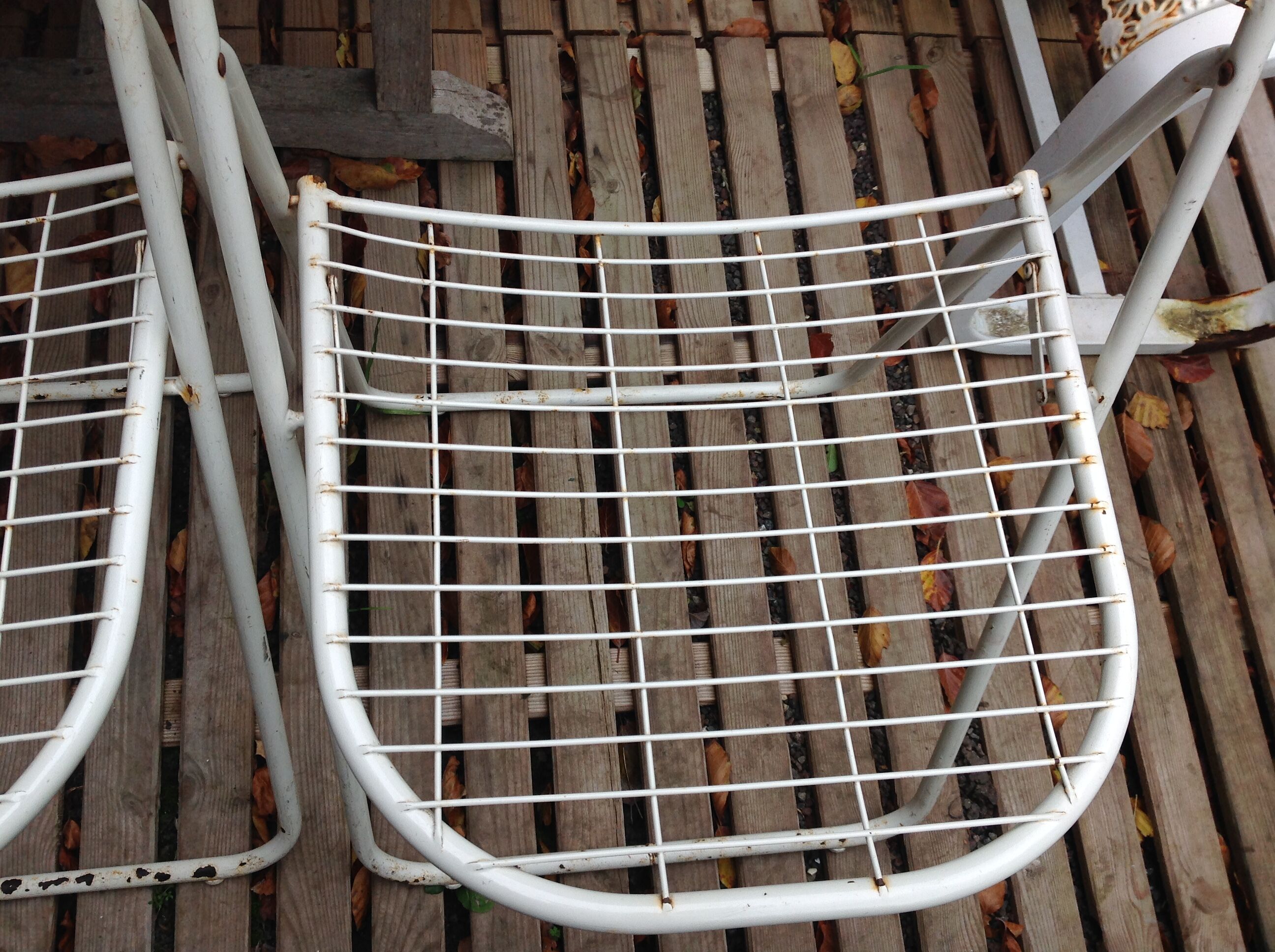 Trio of folding metal chairs