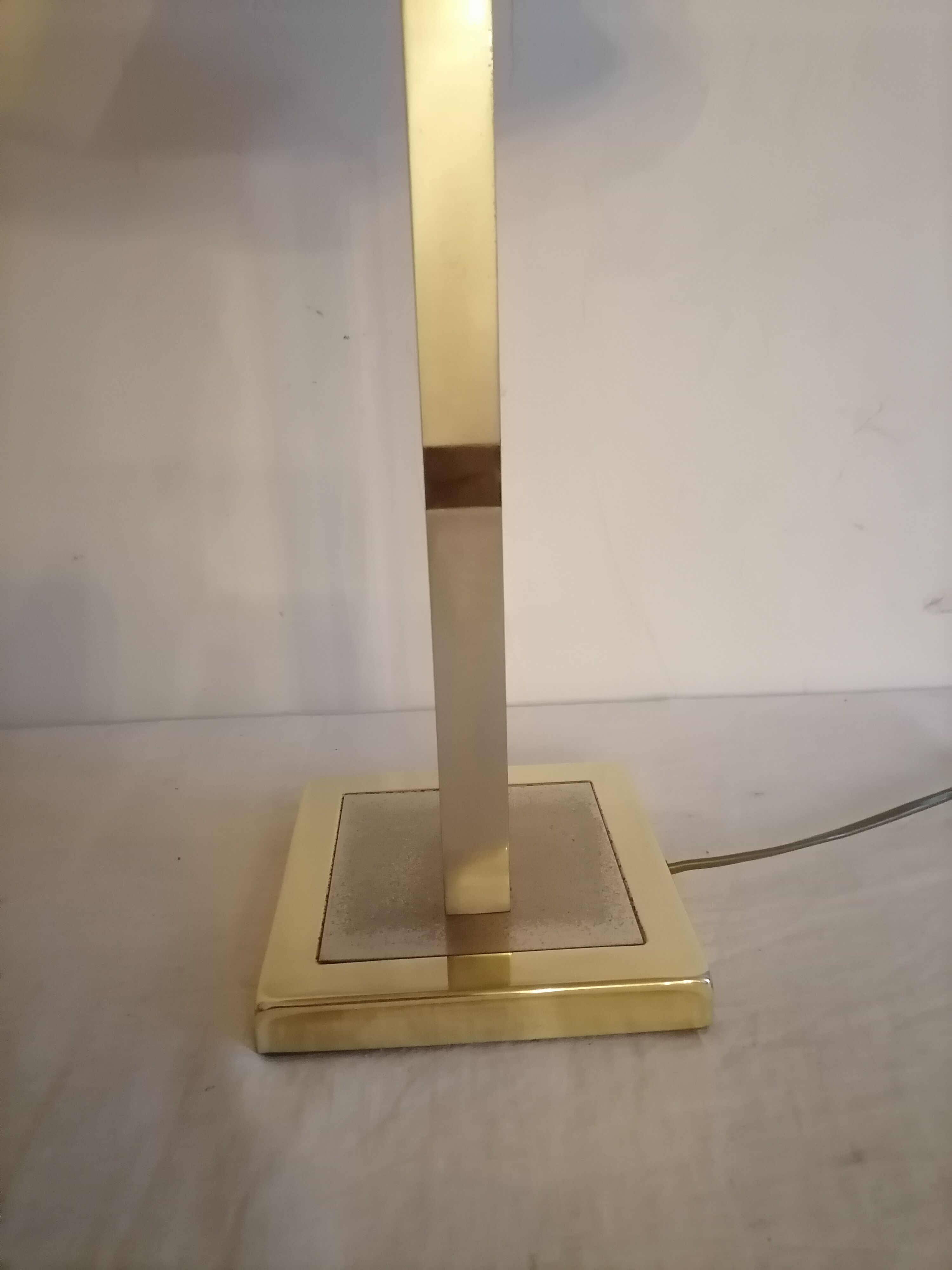 Modernist lamp. Brushed steel and brass.