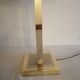 Modernist lamp. Brushed steel and brass.