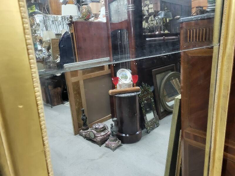 Large gilt mirror in 2 parts from the early 19th century