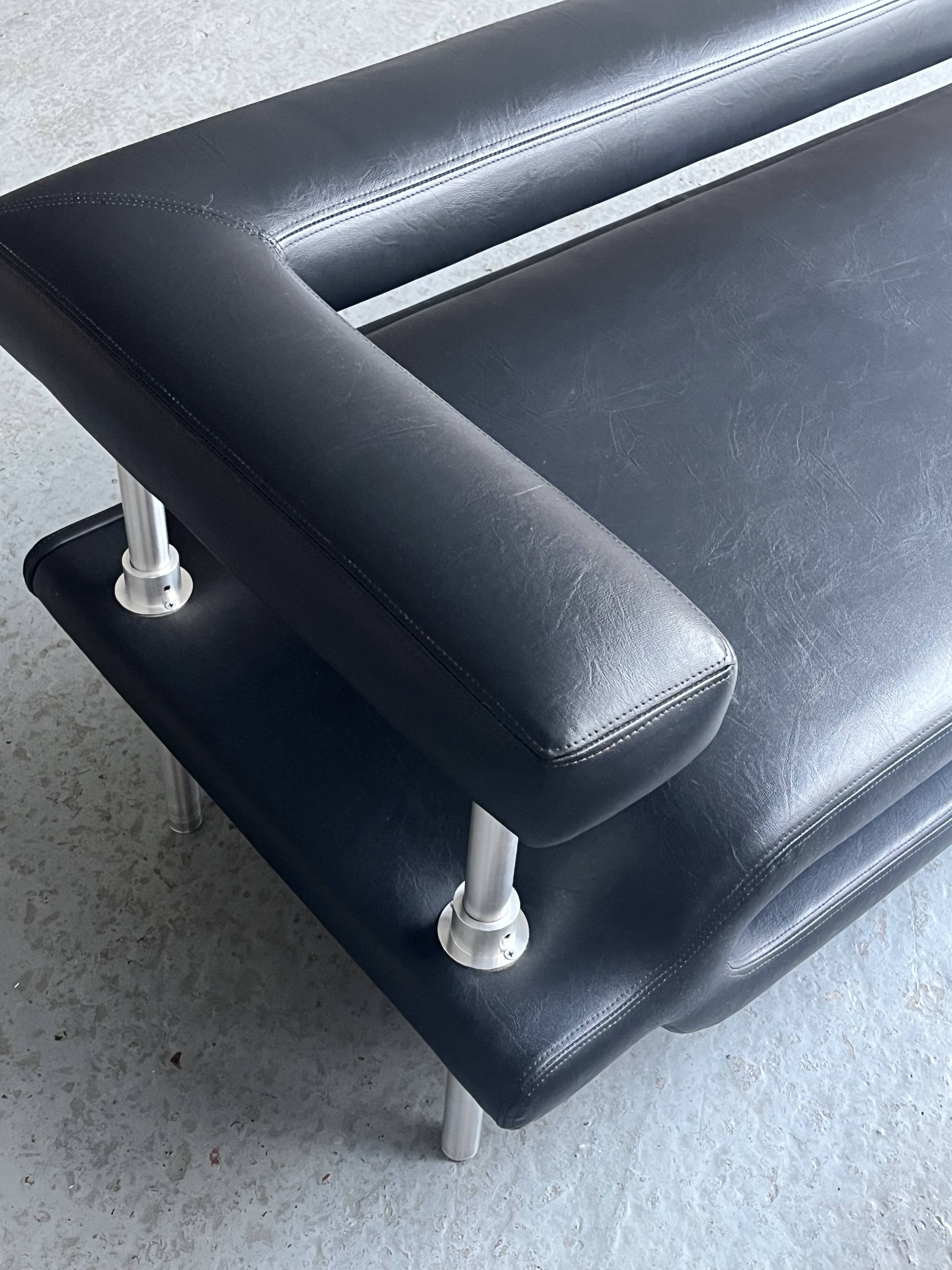 ‘Magazine’ easy chair and 2-seater by Michael Young