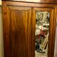 Oak wood cabinet with mirror, red velvet carpeted inside