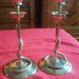 Pair of bronze candlesticks depicting a snake