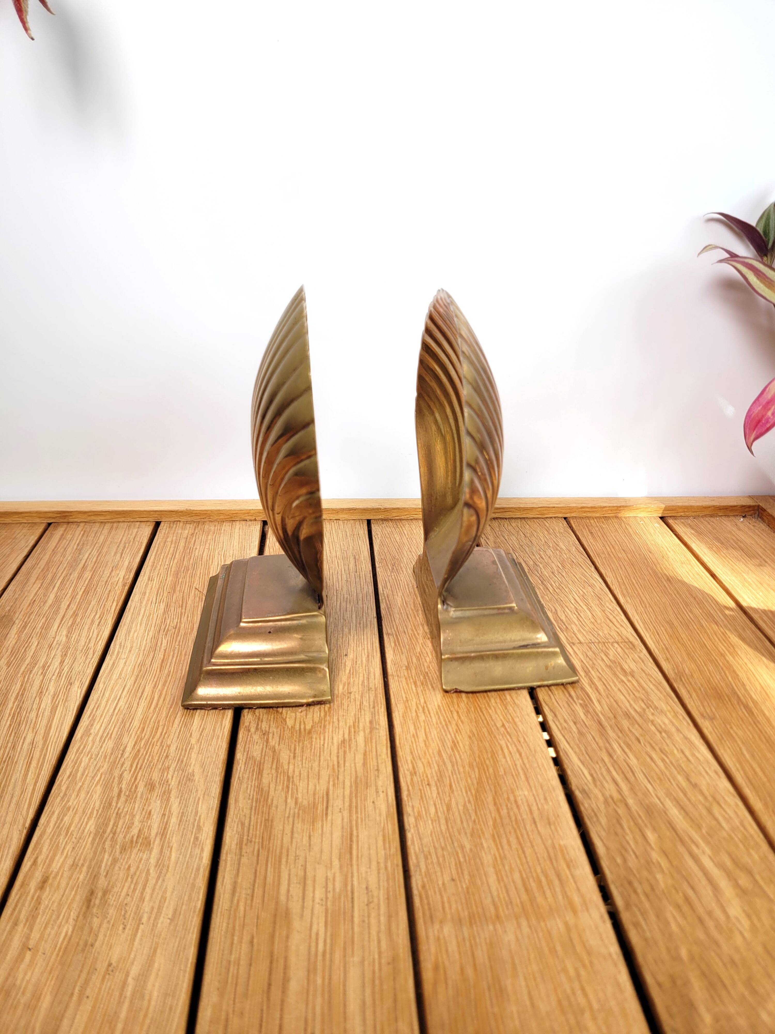 Pair of brass shell bookends