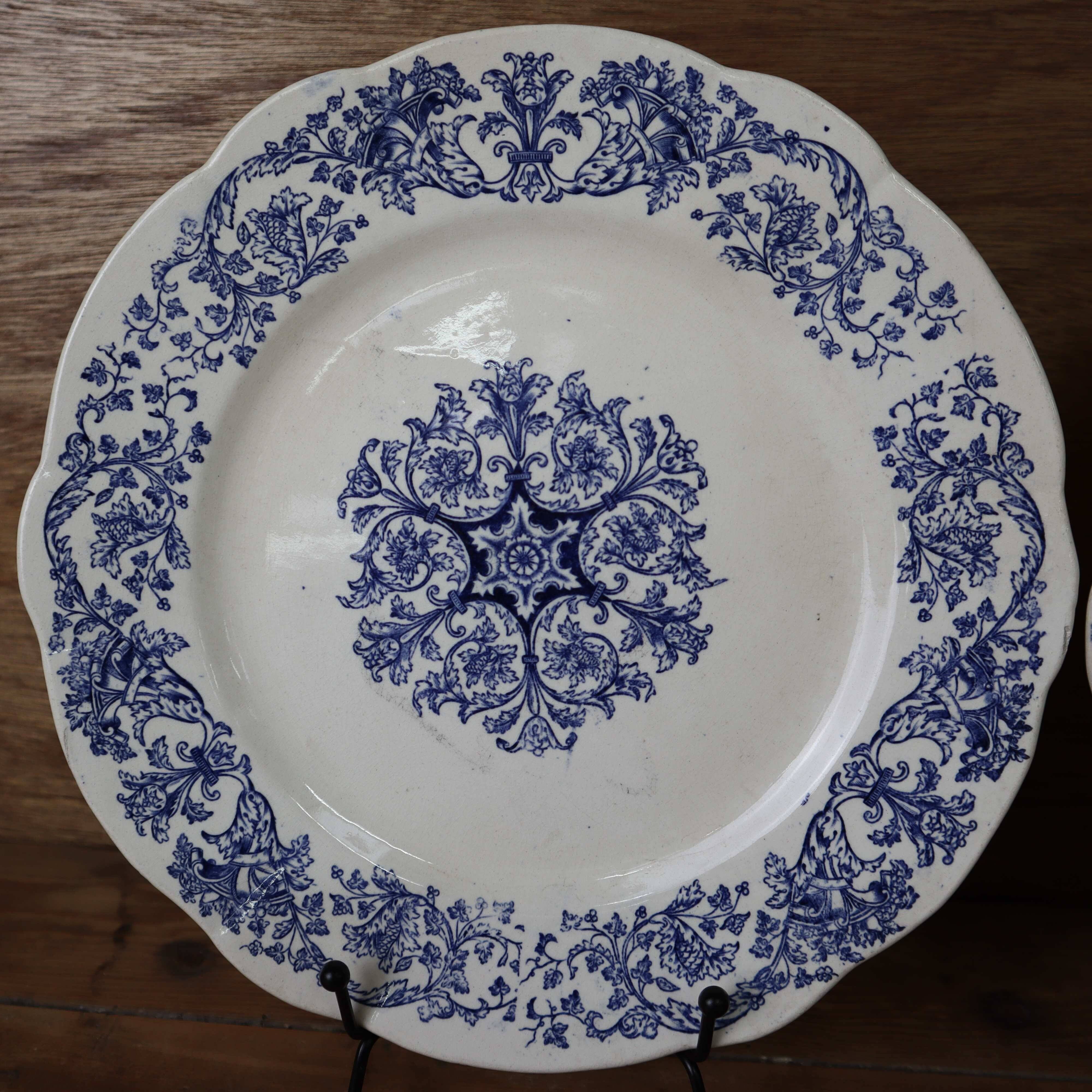 2 Old Longchamp BELLA iron earth plates, 19th century