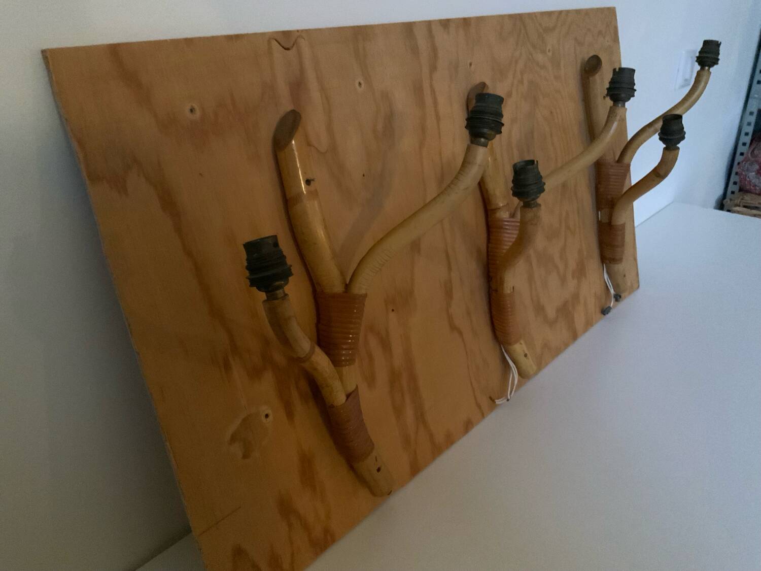 Rattan wall light trio