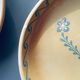 The six Piaf plates in painted terracotta