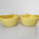 Two yellow ceramic dishes
