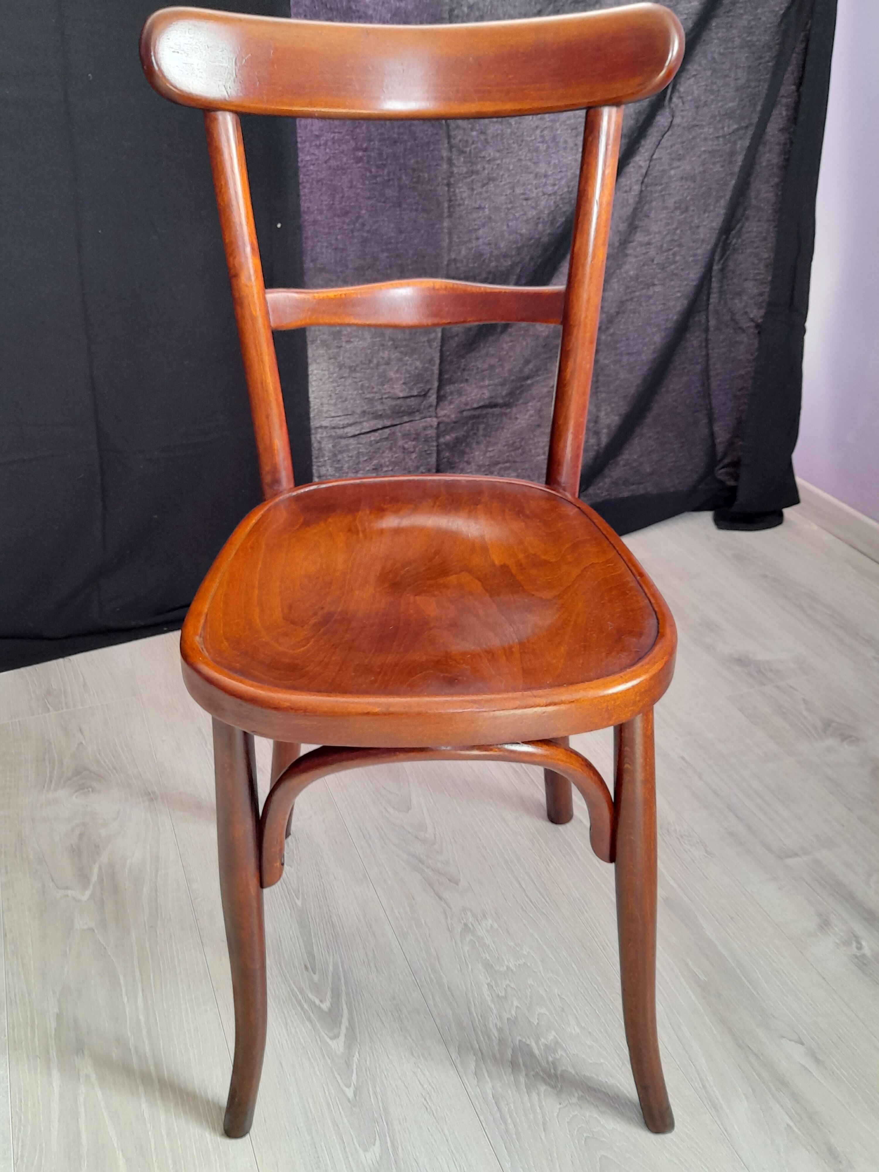 Suite of 4 bistro chairs, published by fischel