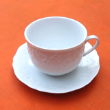 Cup and saucer for breakfast white porcelain limoges france floral decoration