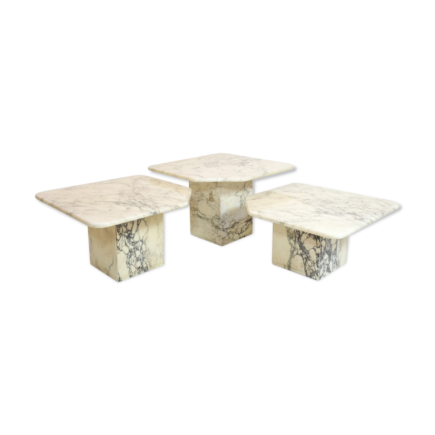 Suite of three marble trundle tables, 1970s