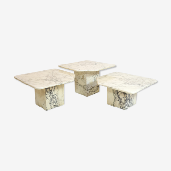 Suite of three marble trundle tables, 1970s