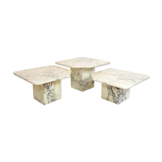 Suite of three marble trundle tables, 1970s