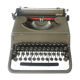 Machine à écrire olivetti et sa valise rotin