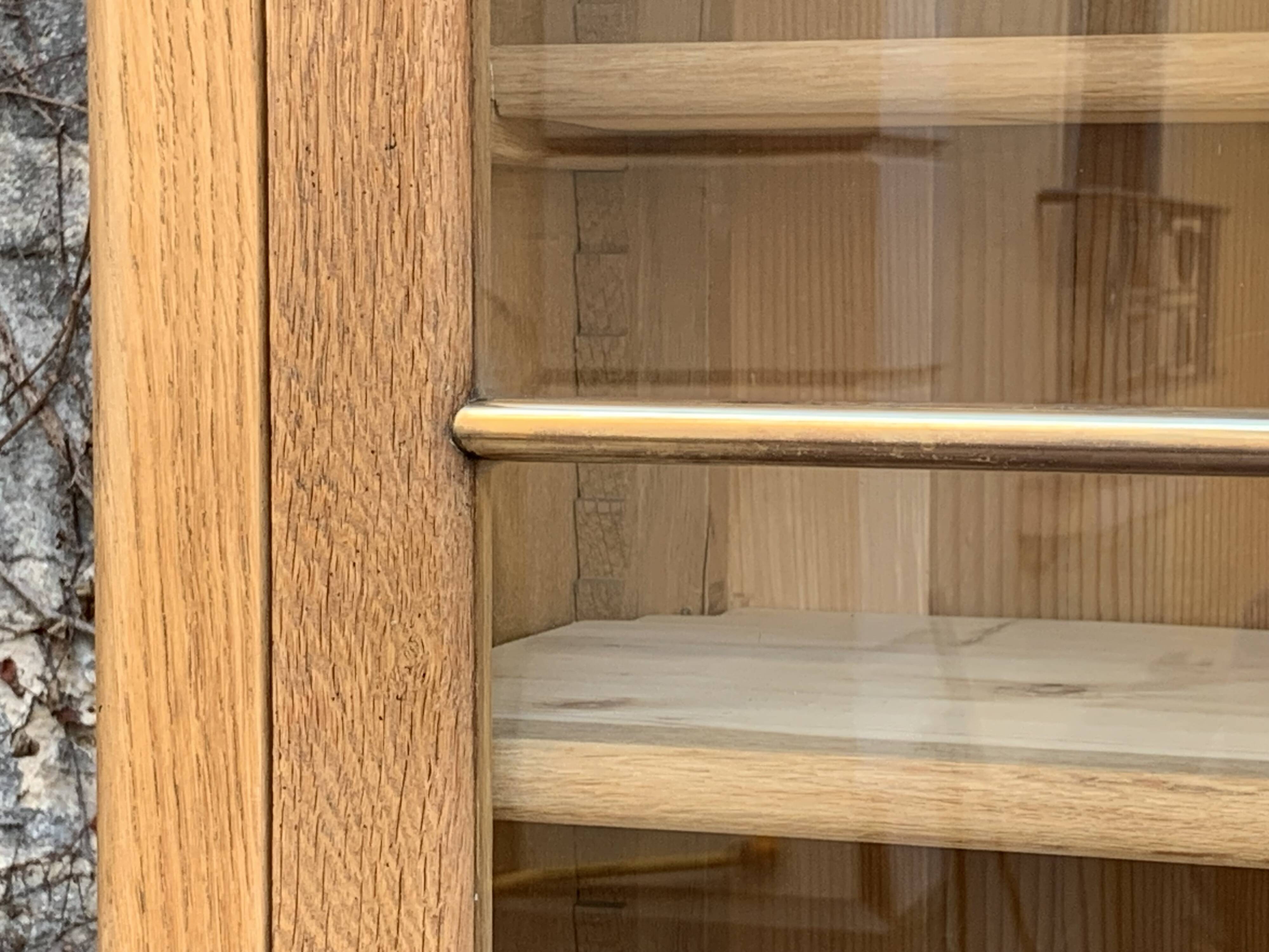 Parisian glass cabinet in solid raw oak, 1950