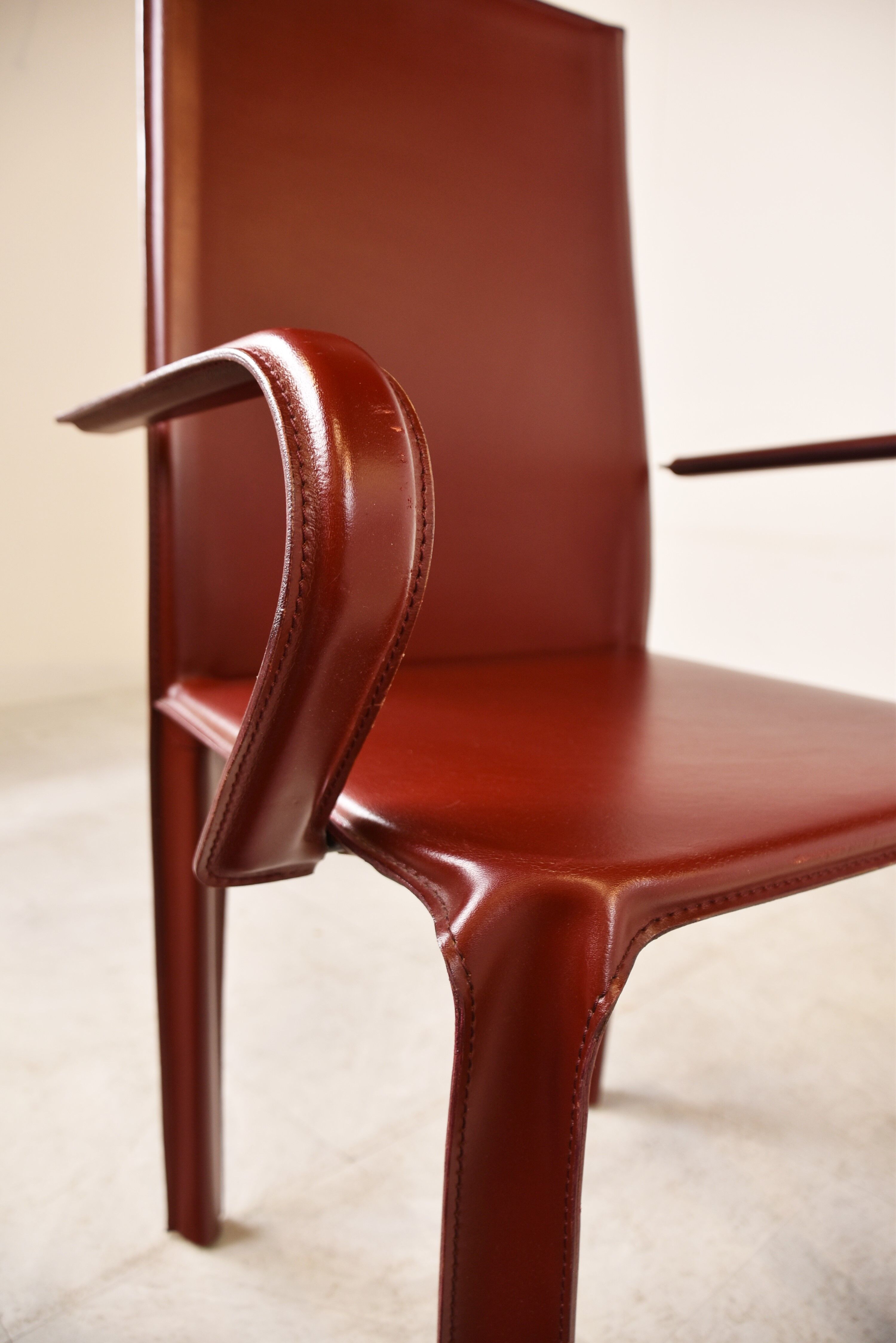 4 red leather dining chairs by Arper italy, 1980s