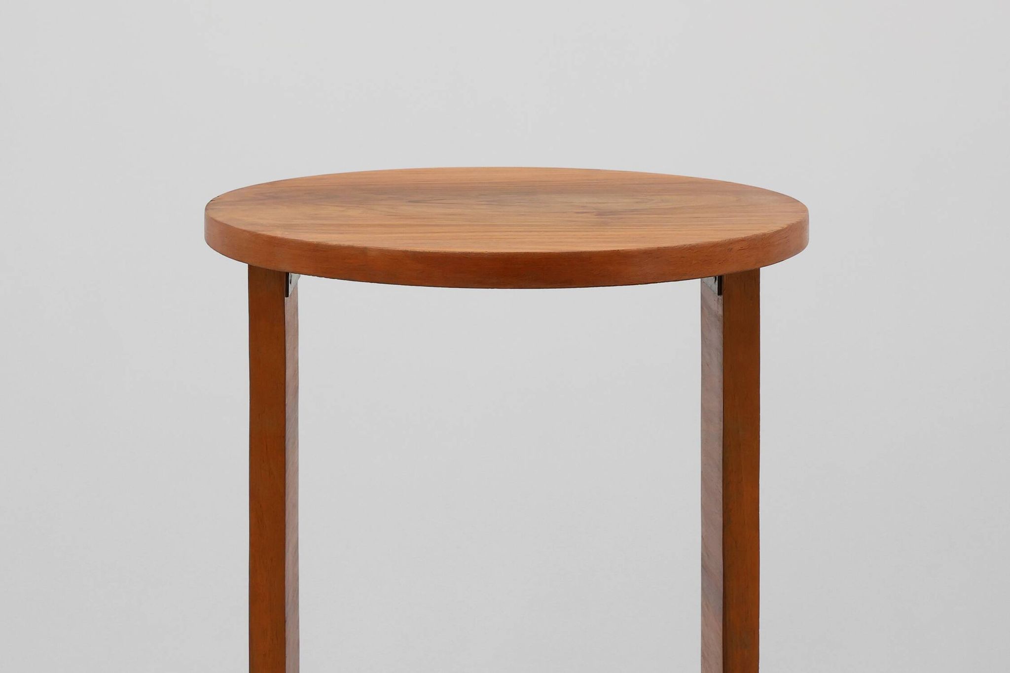 Art deco oak wooden round side table with bended leg, France 1920s