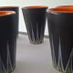 Six Orange and Black Ceramic Vases Vallauris André Baud