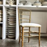 Napoleon III chair in gilded bamboo wood and beige cotton.