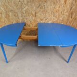 round table with 4 chairs and 2 extensions
