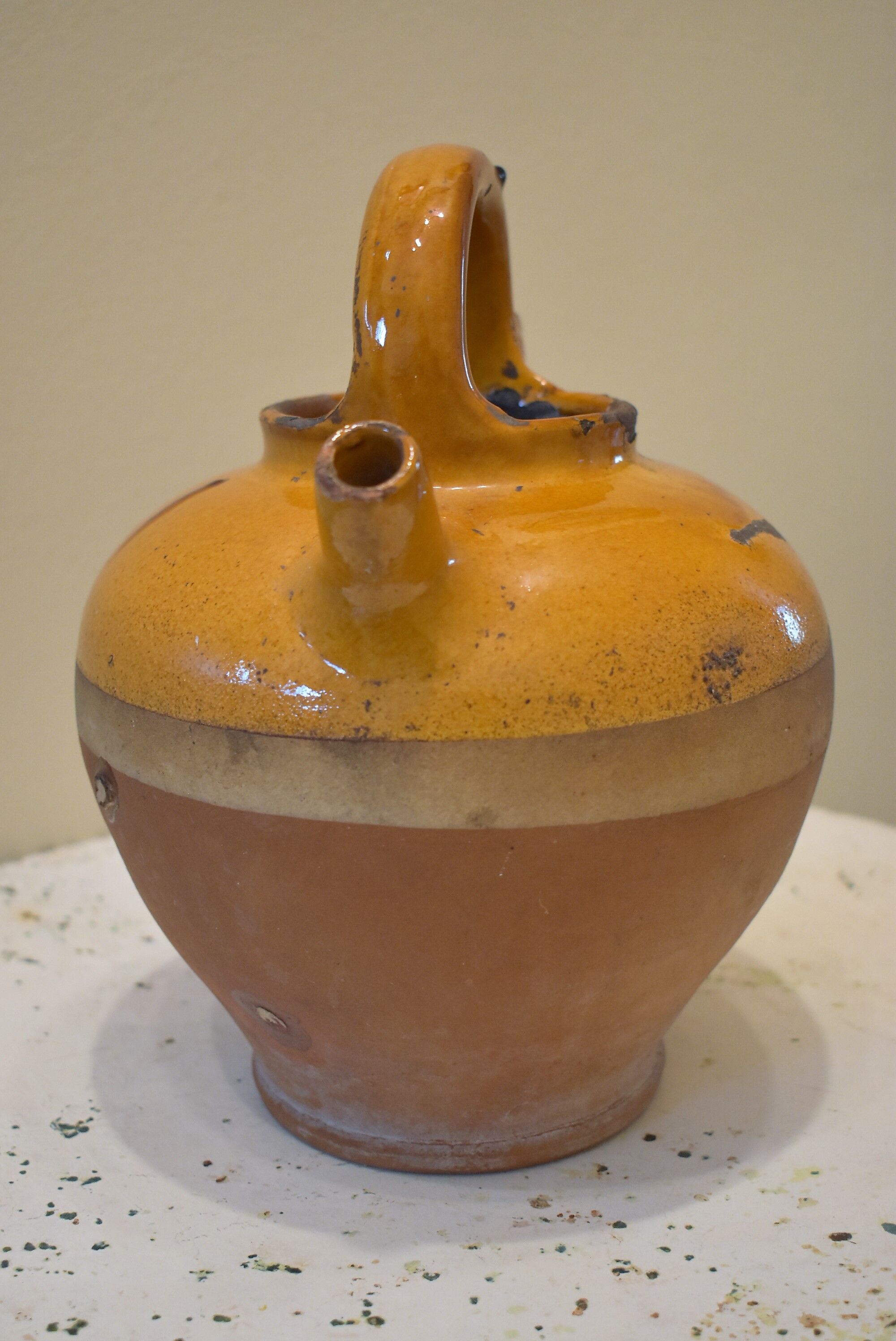 Old glazed ceramic jug