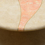 Travertine coffee table with swiveling top.