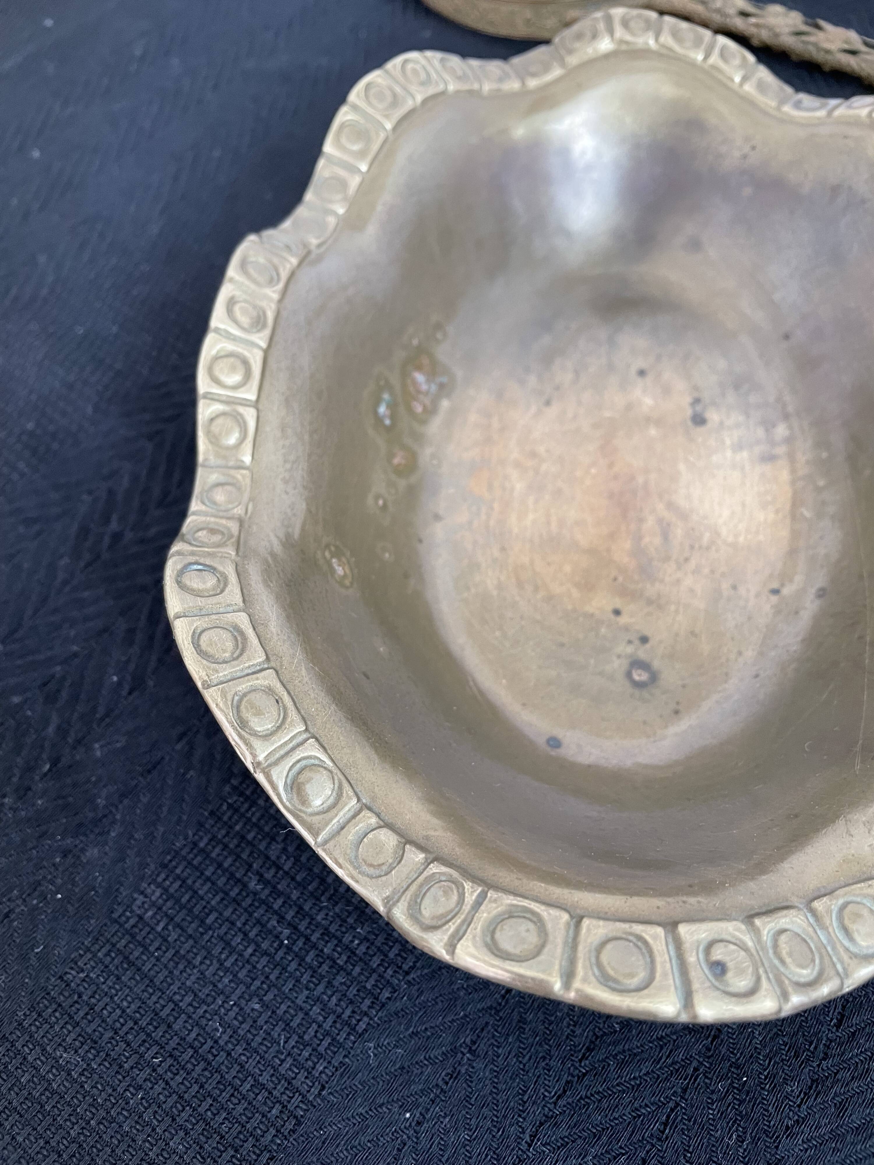 Antique hammered brass cup - pocket empty - golden - frieze