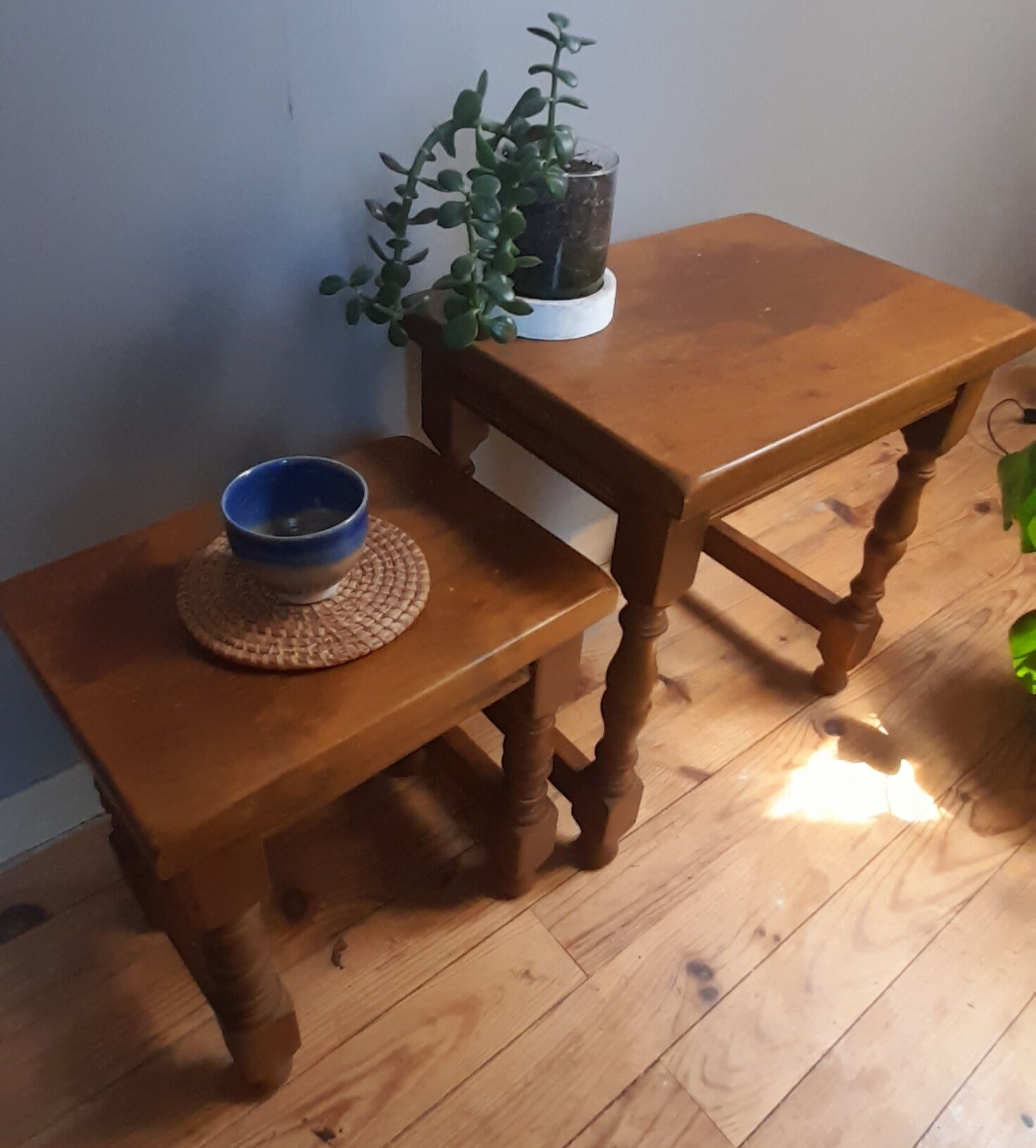 2 solid wood trundle tables, turned legs 80