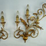 Pair of large floral wall lamps in gilded and lacquered metal. Italy 1960s