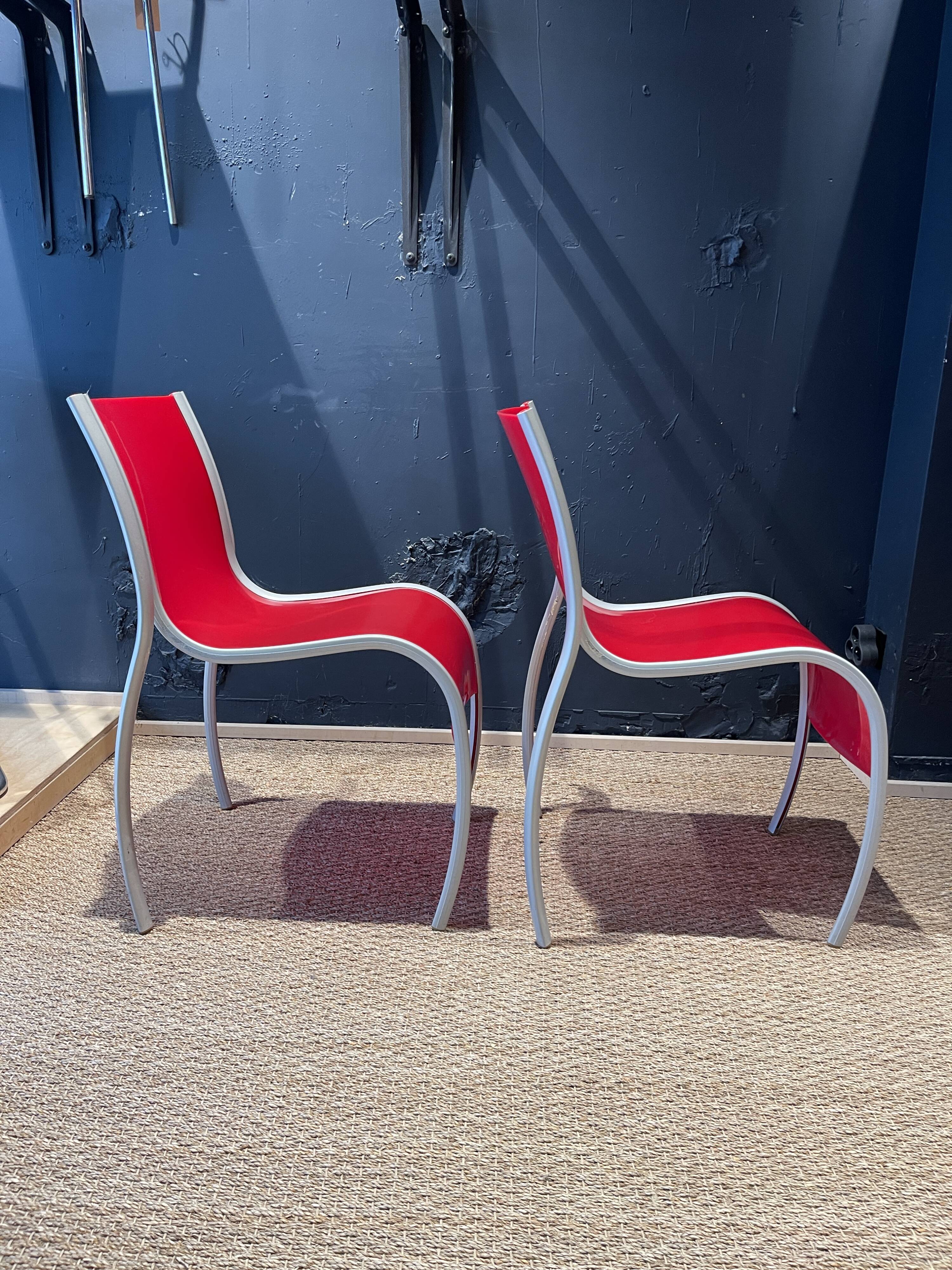 Pair of FPE chairs by Ron Arad for Kartell red Italy 2000s