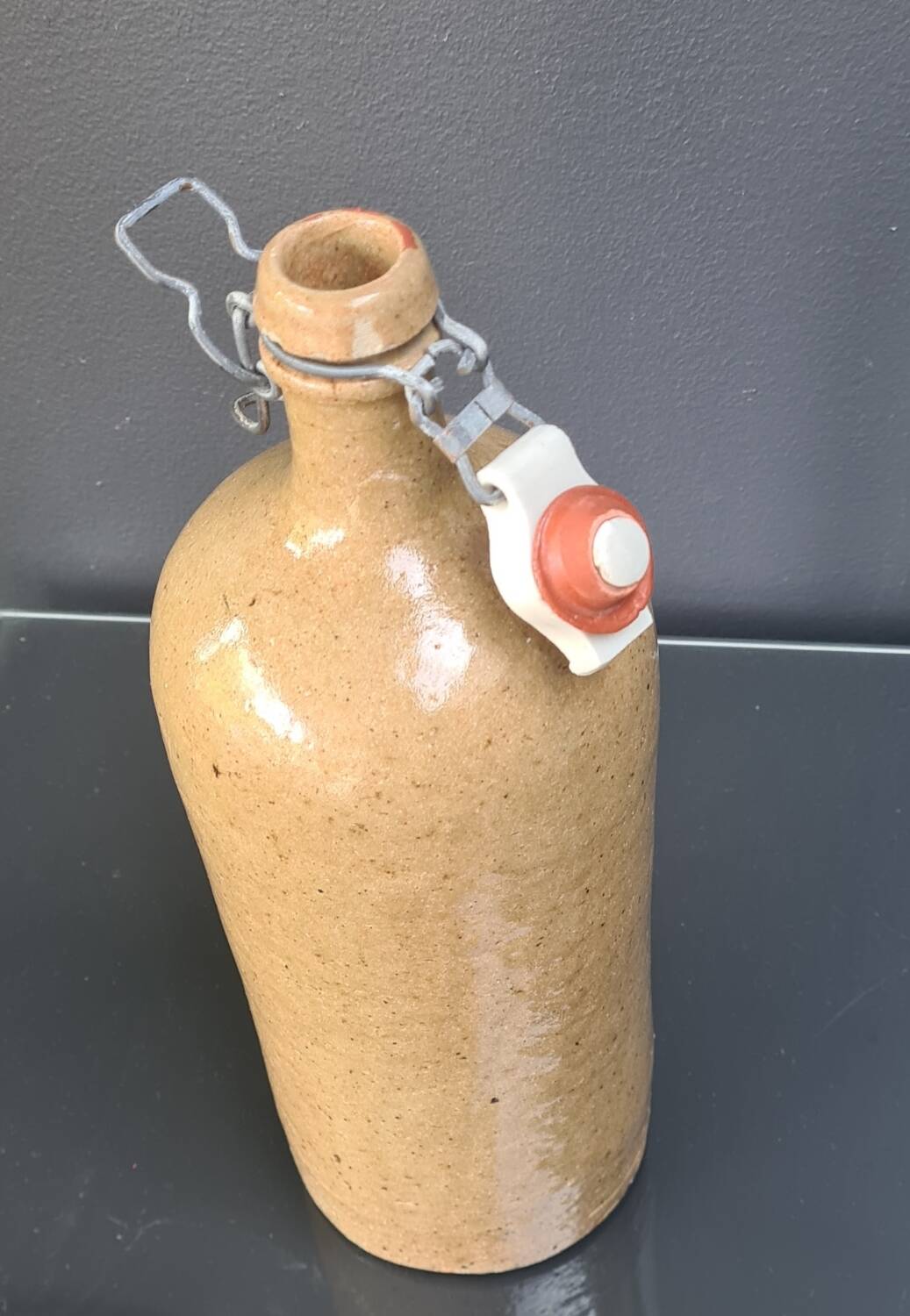 Old stoneware bottle/hot water bottle