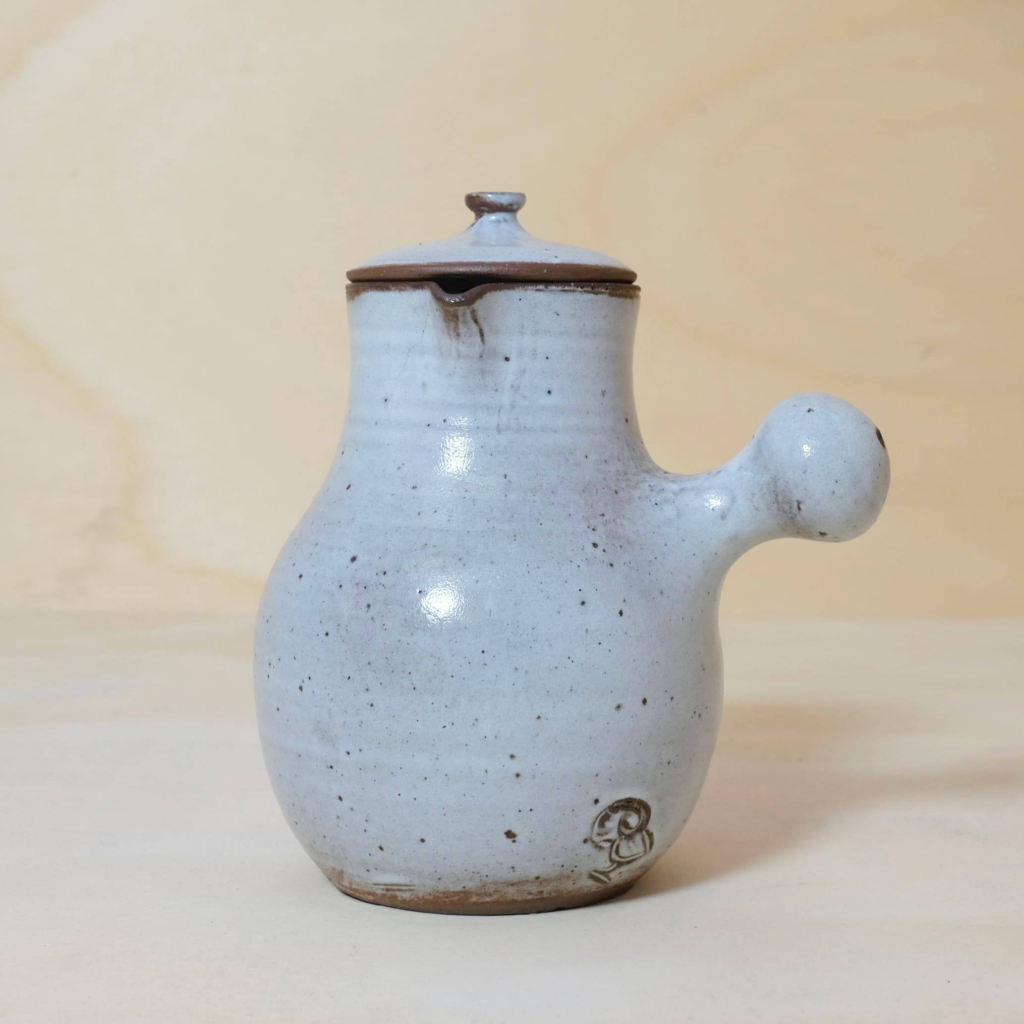 Jeanne and Norbert Pierlot, enamelled stoneware teapot and stopper, 26cm.