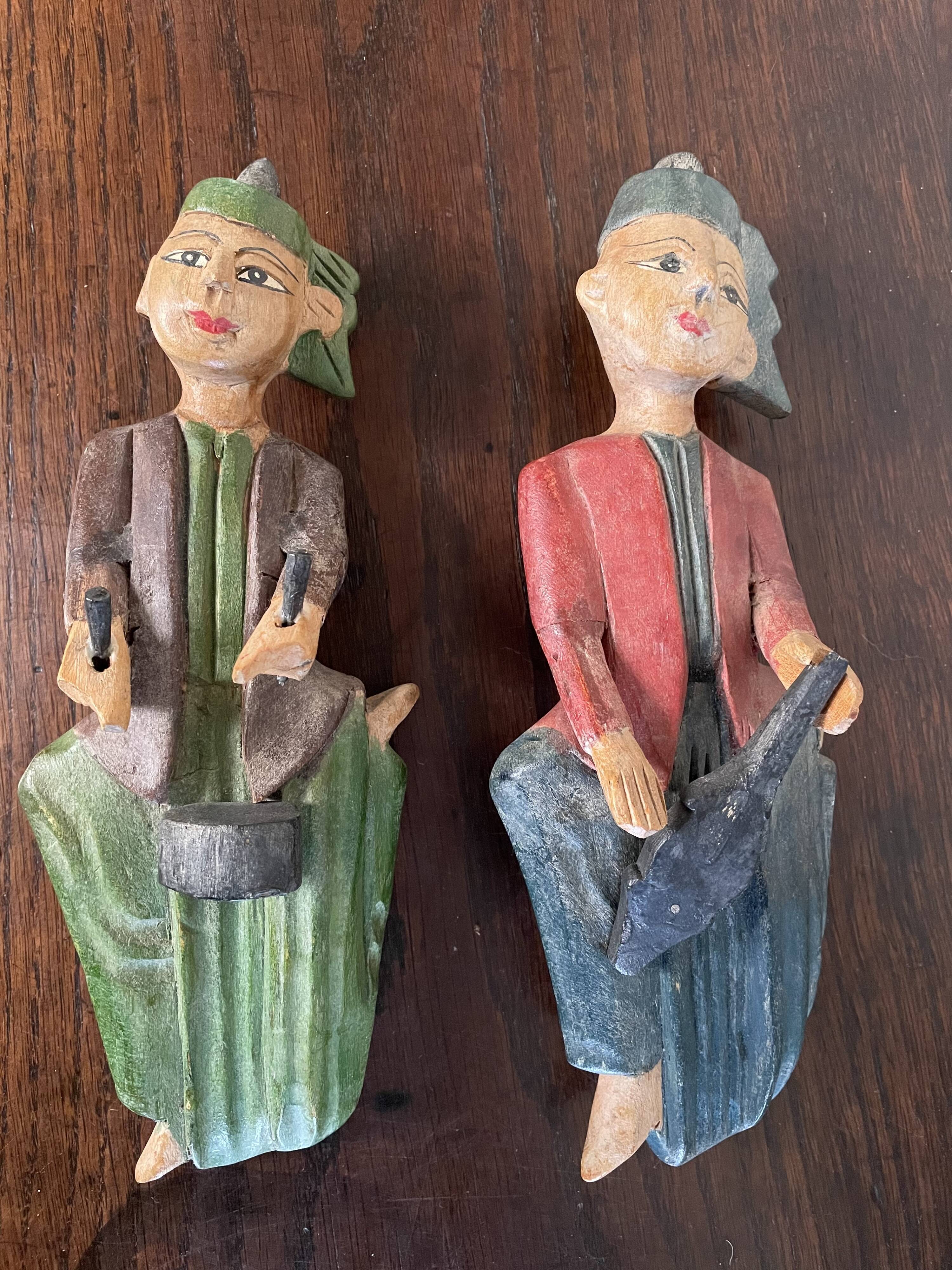 Polychrome wooden statuettes musicians from Asia