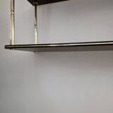 Wooden shelf with gold metal