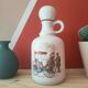 Porcelain carafe with antique decorations