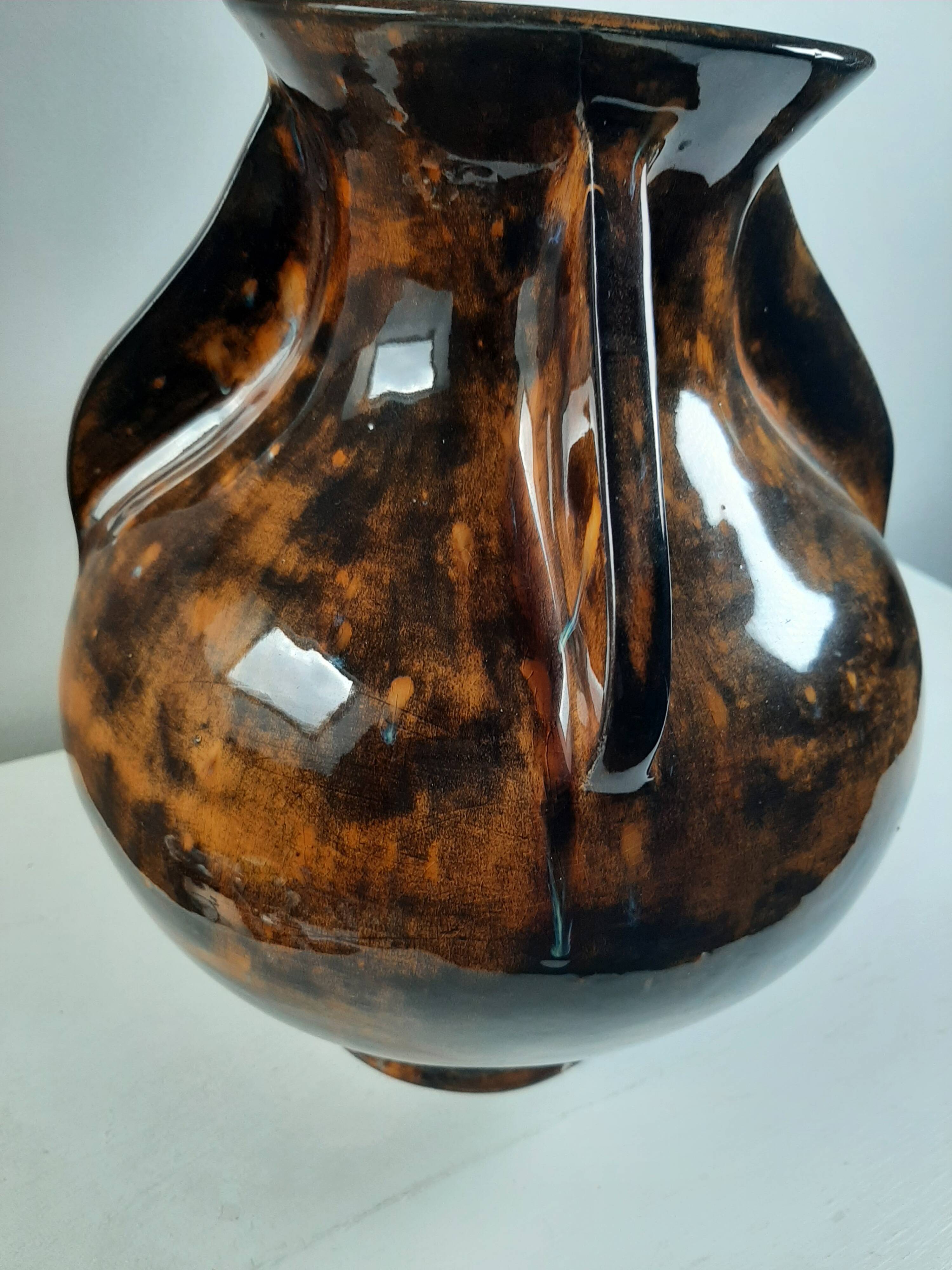 Large vintage vase in the shape of a propeller