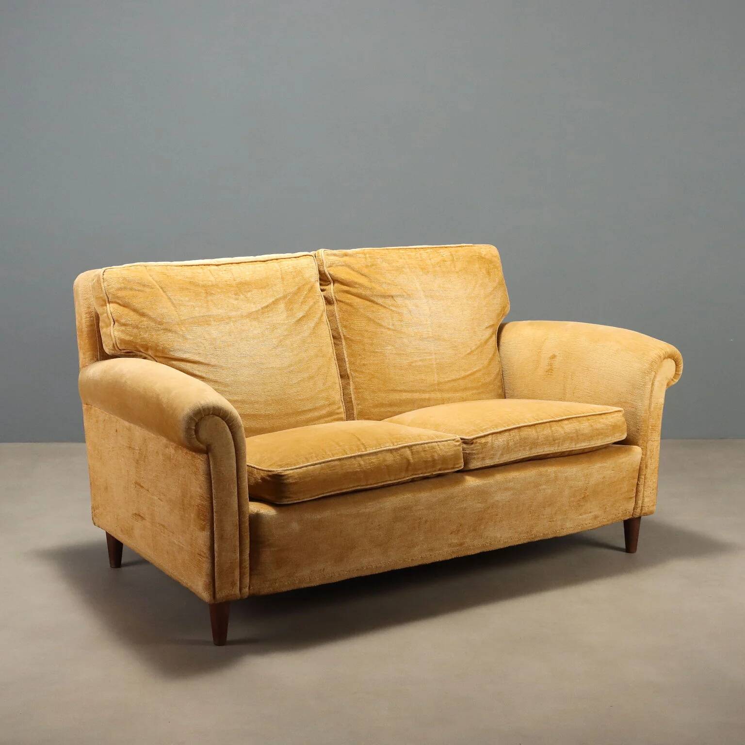 Two-seater velvet sofa from the 1950s to be restored.