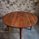 Antique round dining table in cherry wood, France, circa 1920.