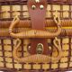 Wicker picnic basket, blue gingham interior.
